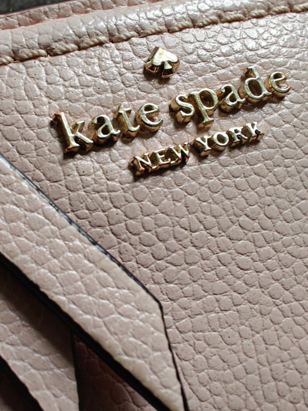 Kate Spade tan-pink L-zip small bifold wallet
